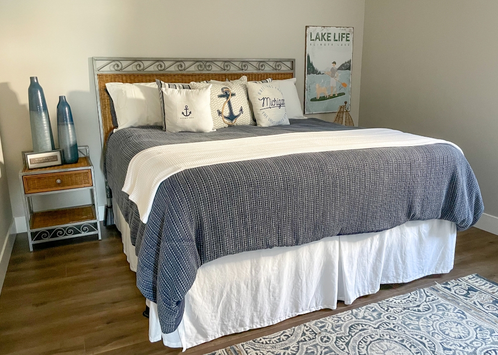 Parade of Homes 2022's guest bedroom with a Lake Life theme