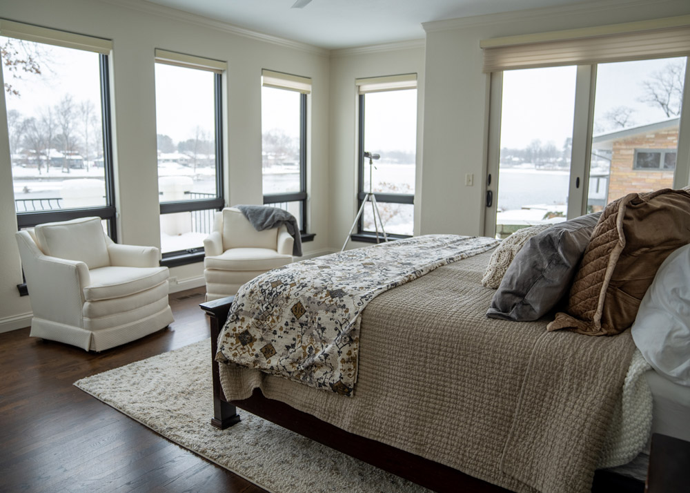 Riverfront Abode's master bedroom overlooking the river